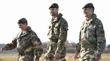 Prince William Visits Welsh Guards for Weapons Training