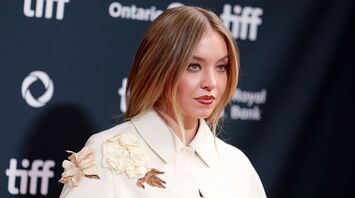Sydney Sweeney Poses Braless in Stunning Rainy Photos