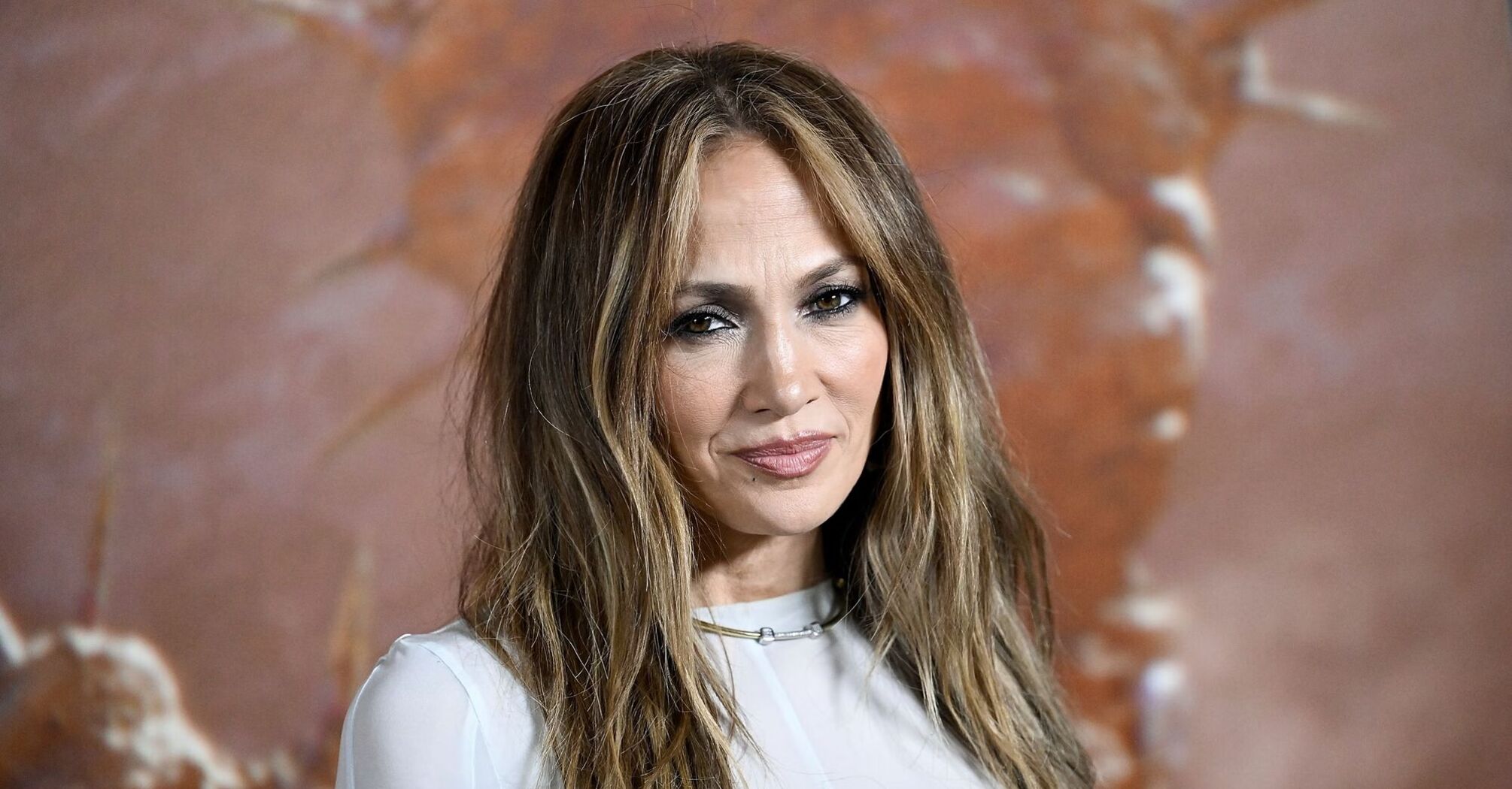 Jennifer Lopez Embraces Comfy Chic Vibes Next to Her Tree for Christmas Eve