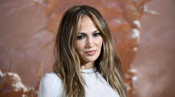 Jennifer Lopez Embraces Comfy Chic Vibes Next to Her Tree for Christmas Eve