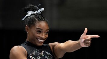 Simone Biles Wears Custom Outfit with Husband Jonathan Owens’ Photos at Bears-Seahawks Game