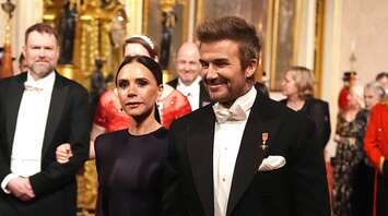 Victoria and David Beckham Make Surprise Appearance at Buckingham Palace