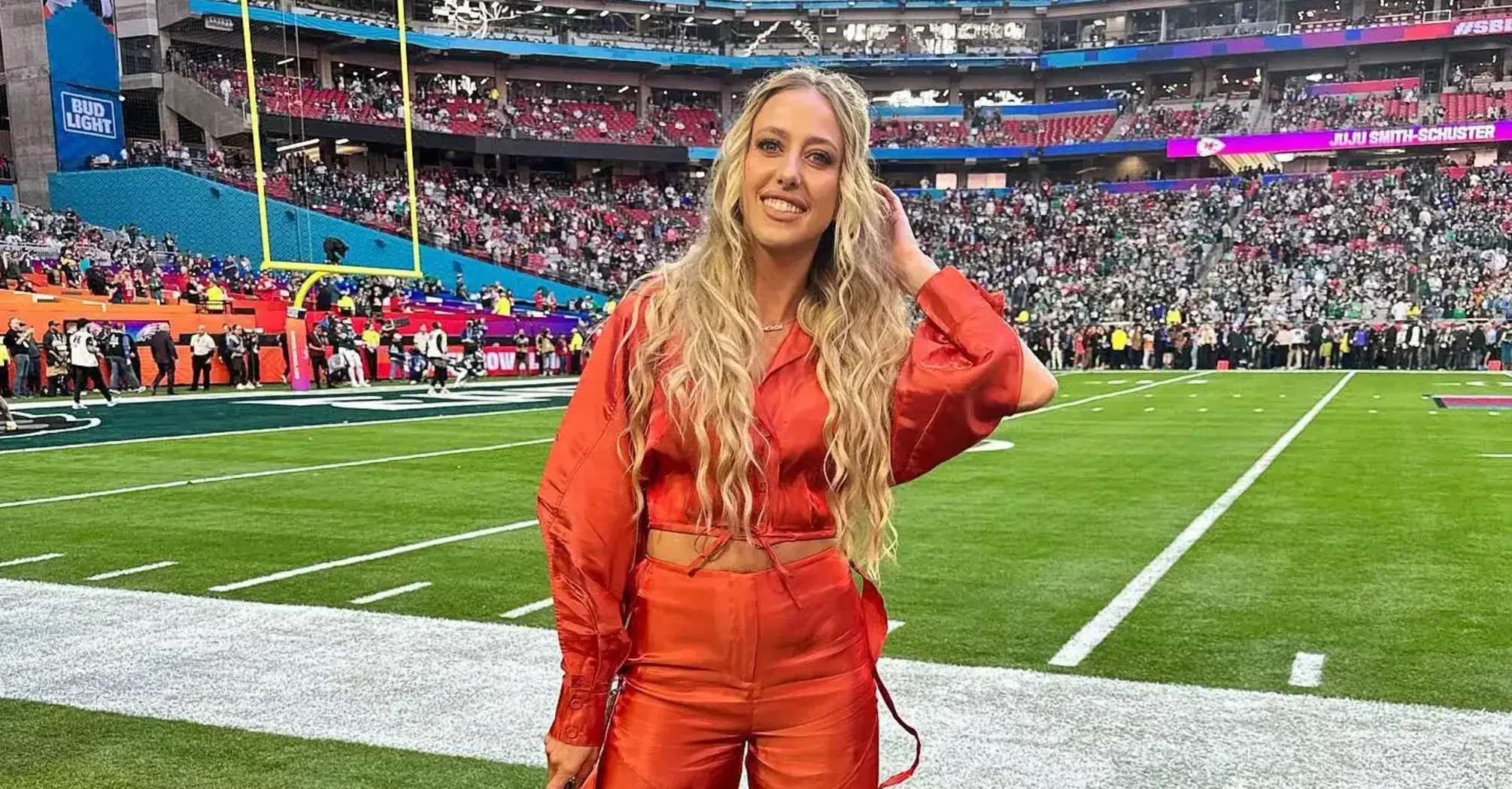 Brittany Mahomes Stuns in Red Patent Leather at Chiefs vs. Chargers Game