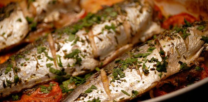 Mackerel baked with potatoes in a sleeve