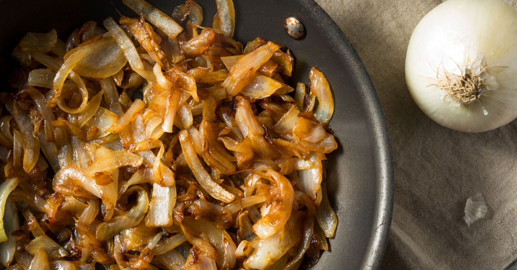 Why add baking soda when frying onions