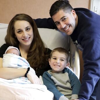 A woman gave birth to two children on February 29 in different leap years