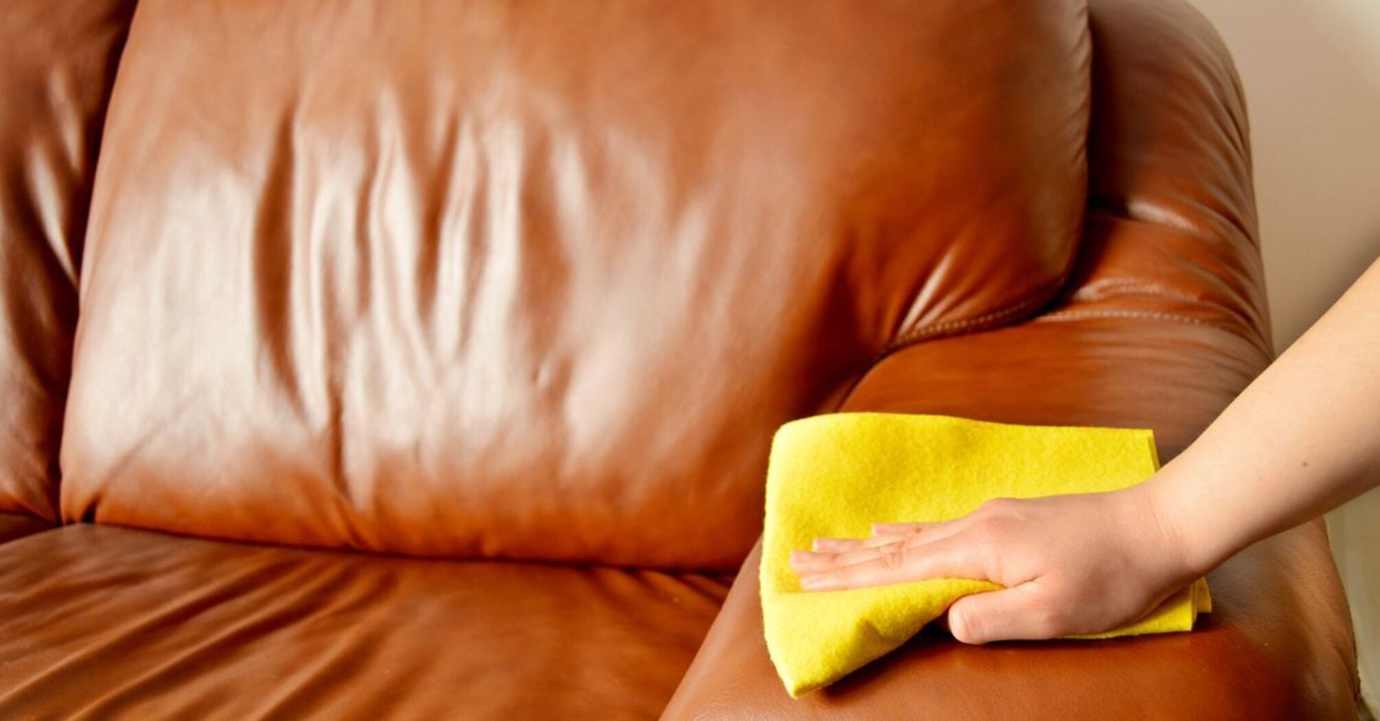 How to effectively clean a leather sofa from stains