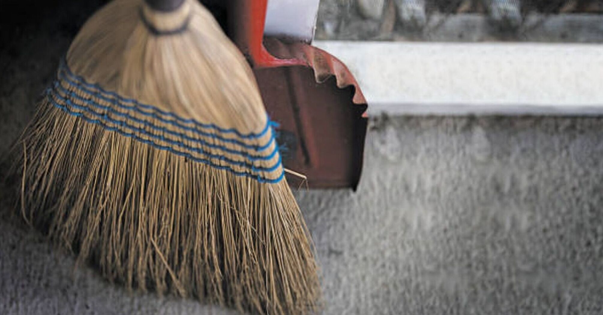 Broom fibers remain after sweeping