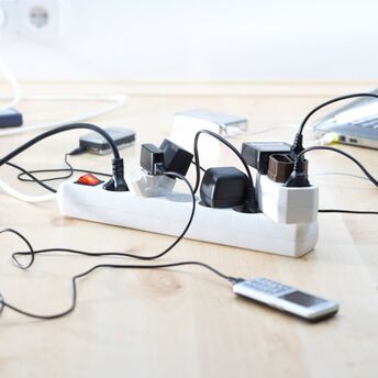 What devices "eat up" a quarter of electricity in homes
