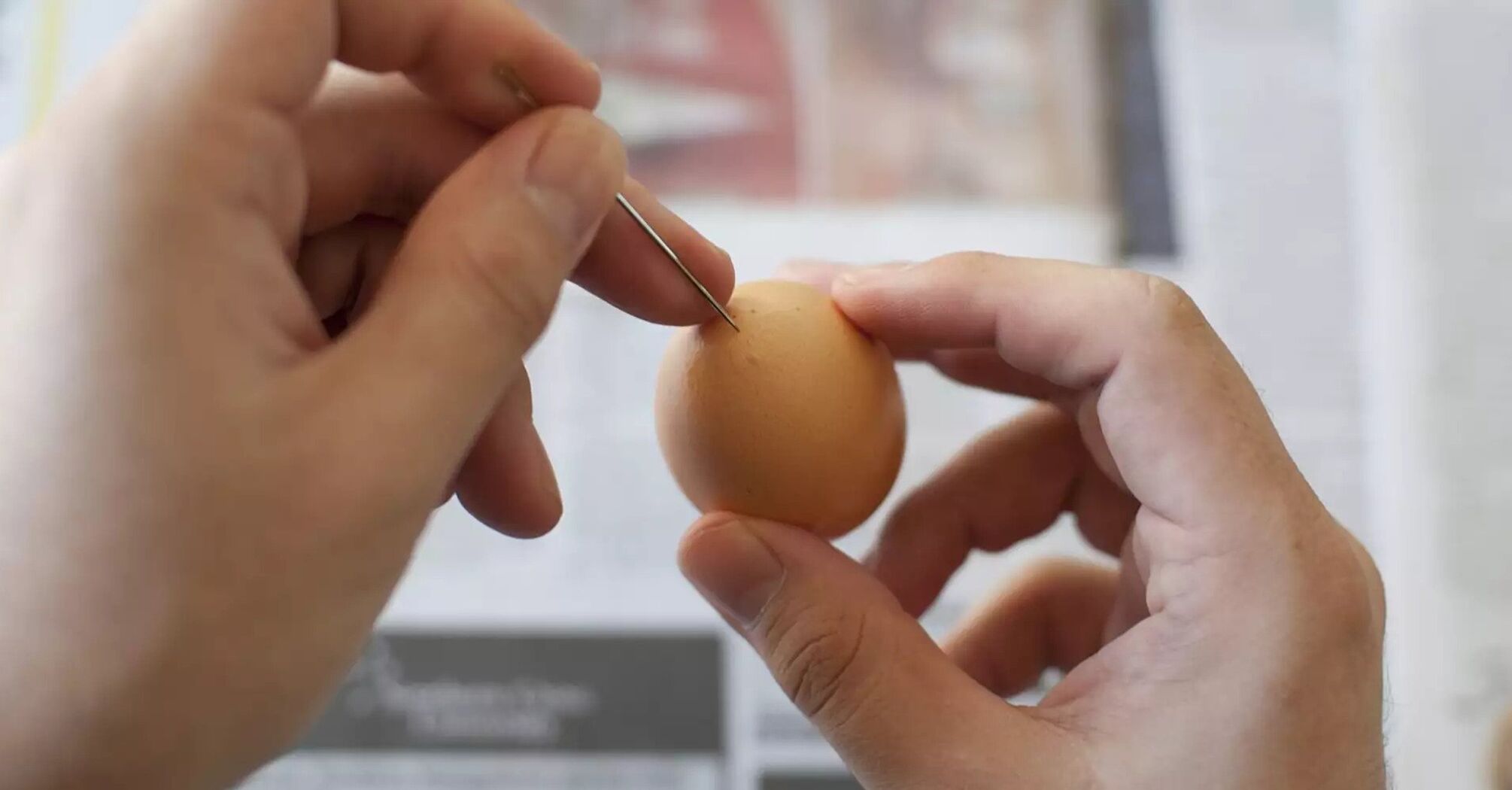 Why pierce an egg with a needle before boiling