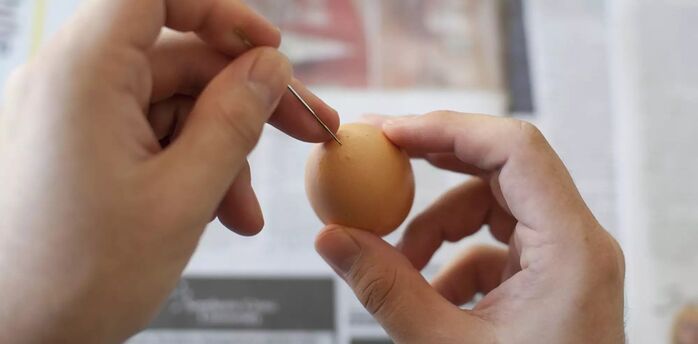 Why pierce an egg with a needle before boiling