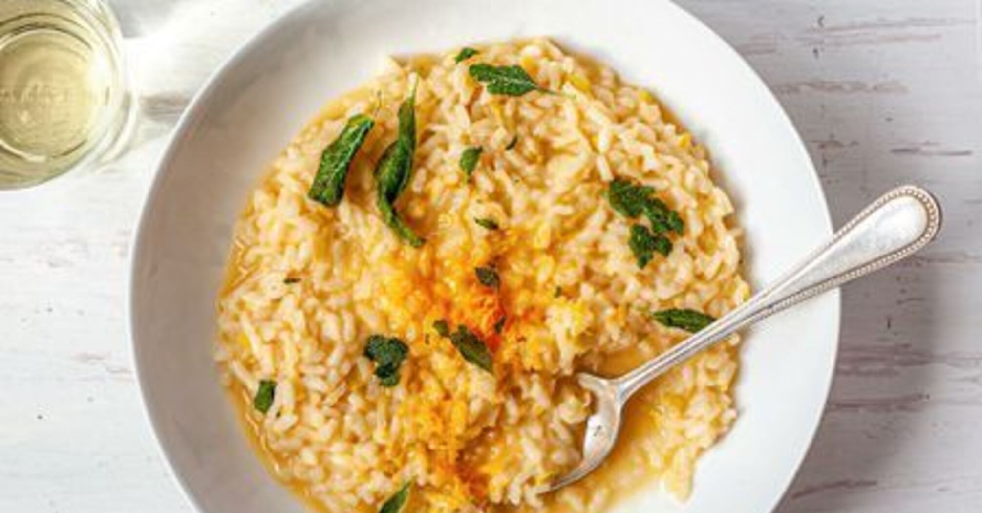 How to cook risotto with balsamic-roasted asparagus and peas