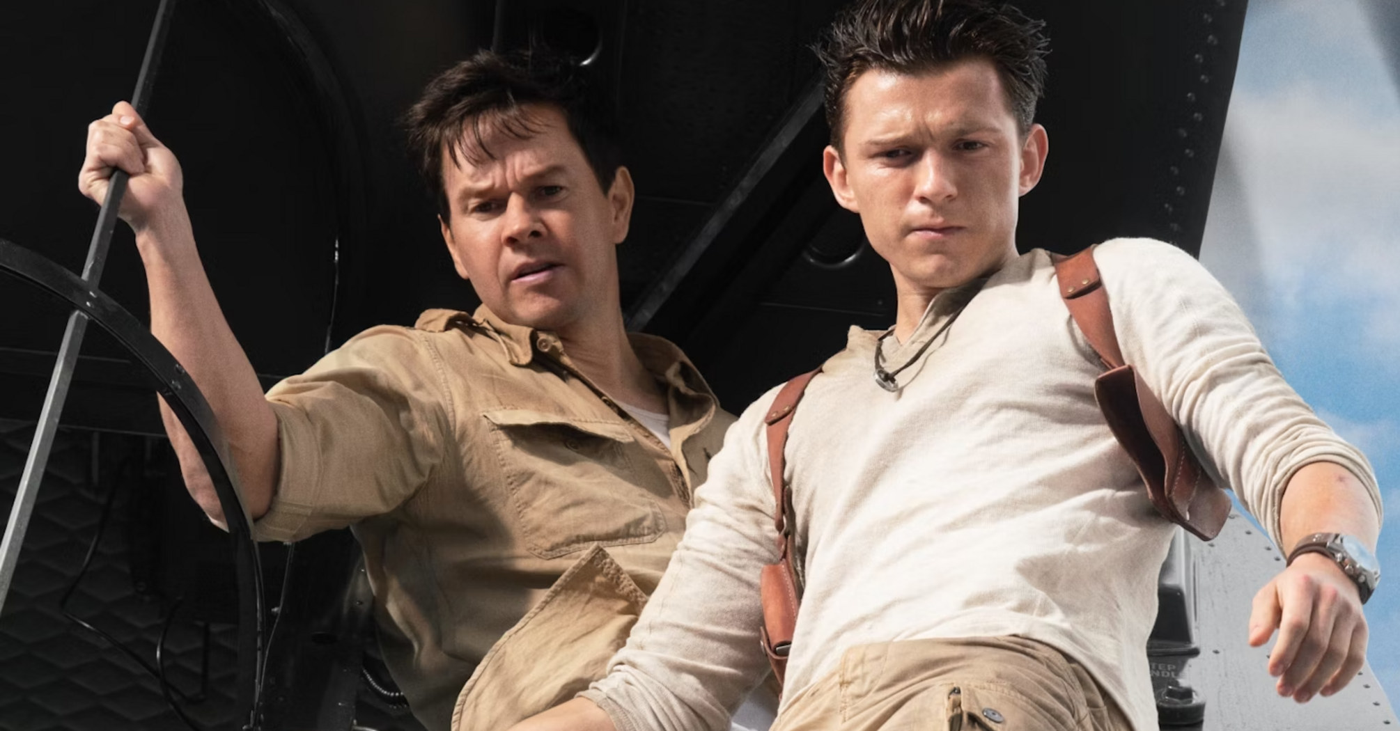 Mark Wahlberg and Tom Holland in Uncharted (2022)