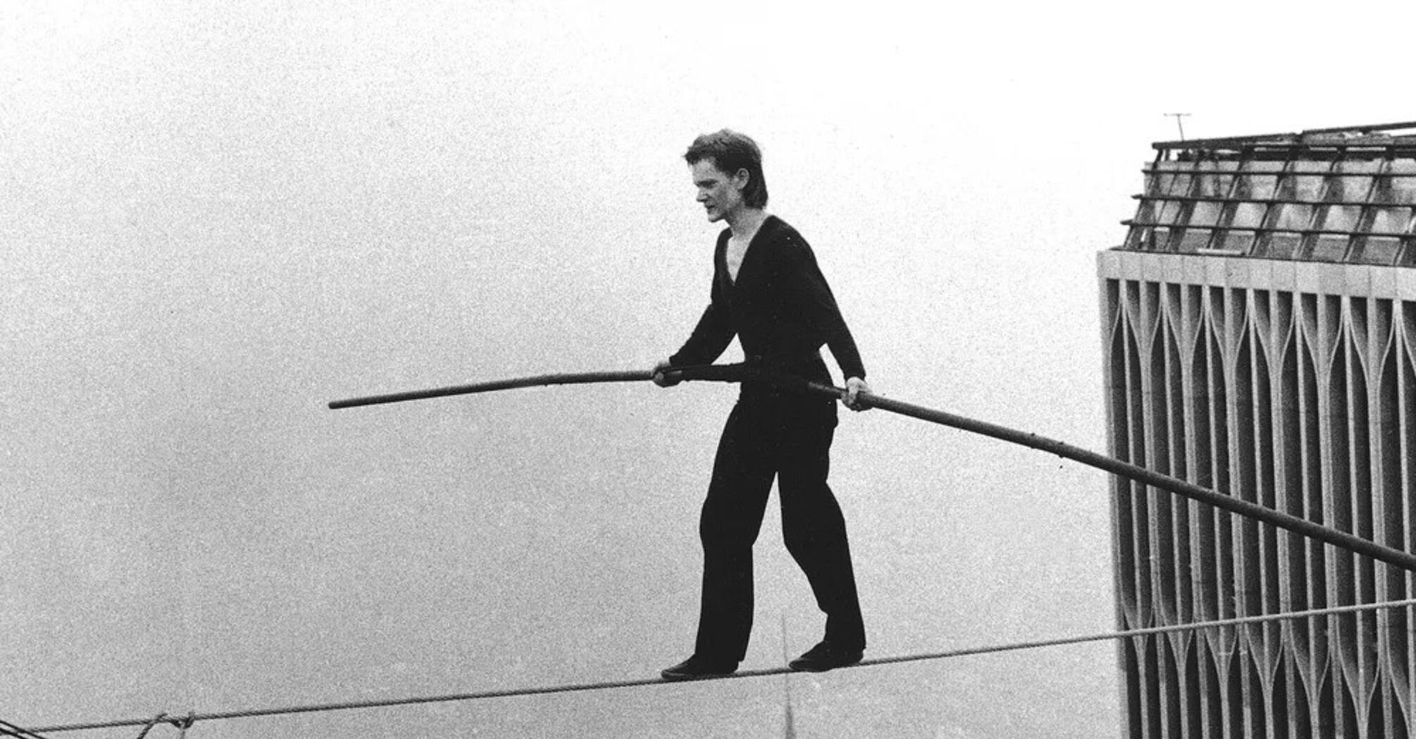 Philipe Petit walk between the twin towers on August 7, 1974