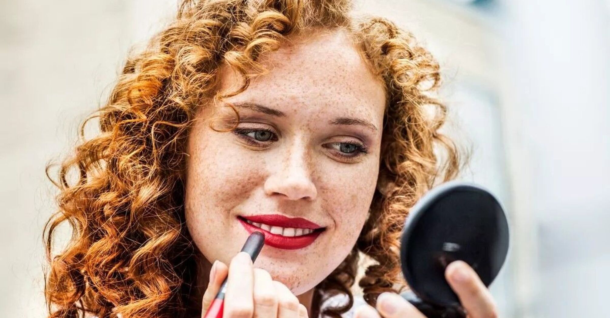 Woman doing makeup