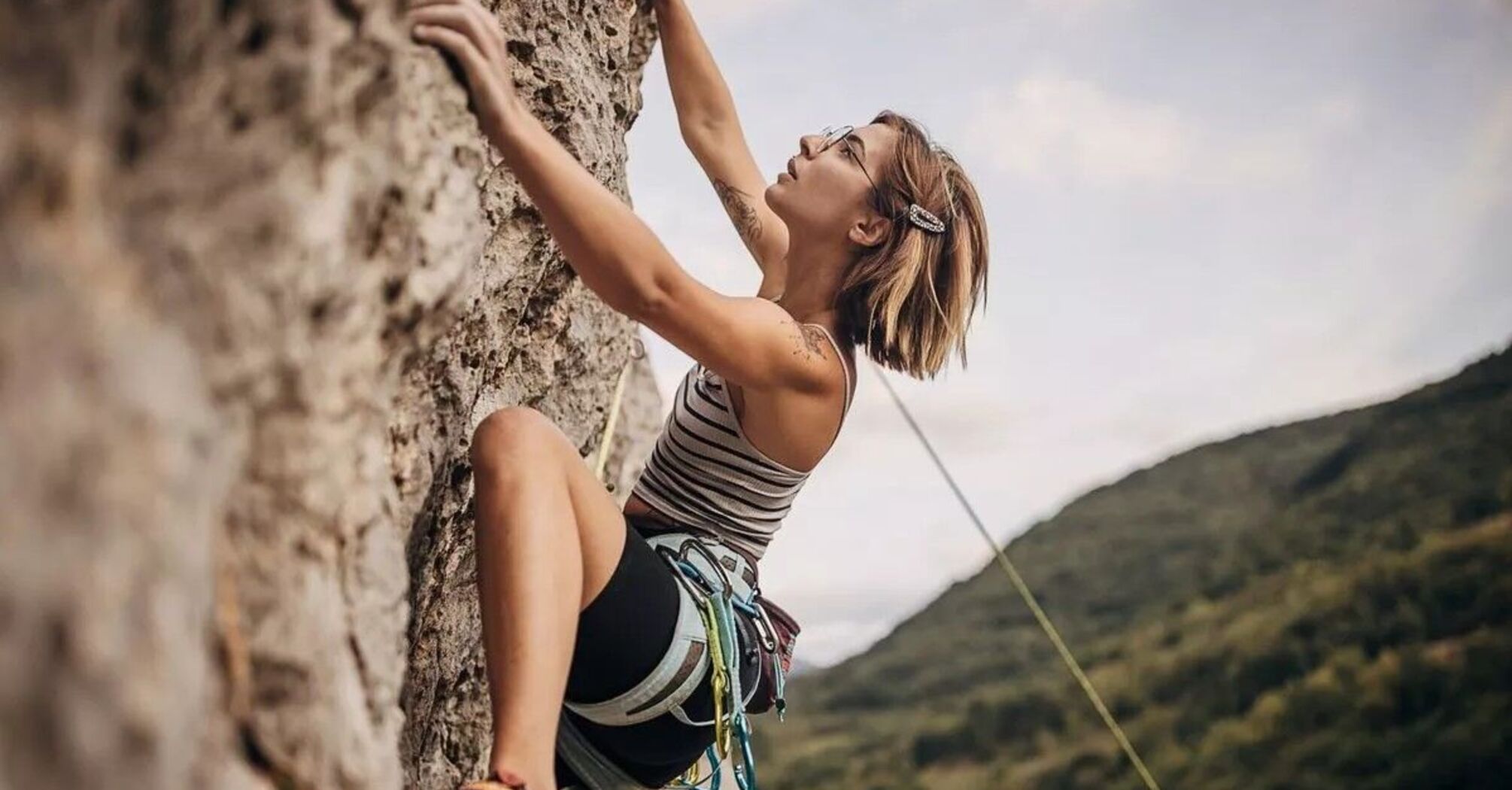 Woman rock climbing