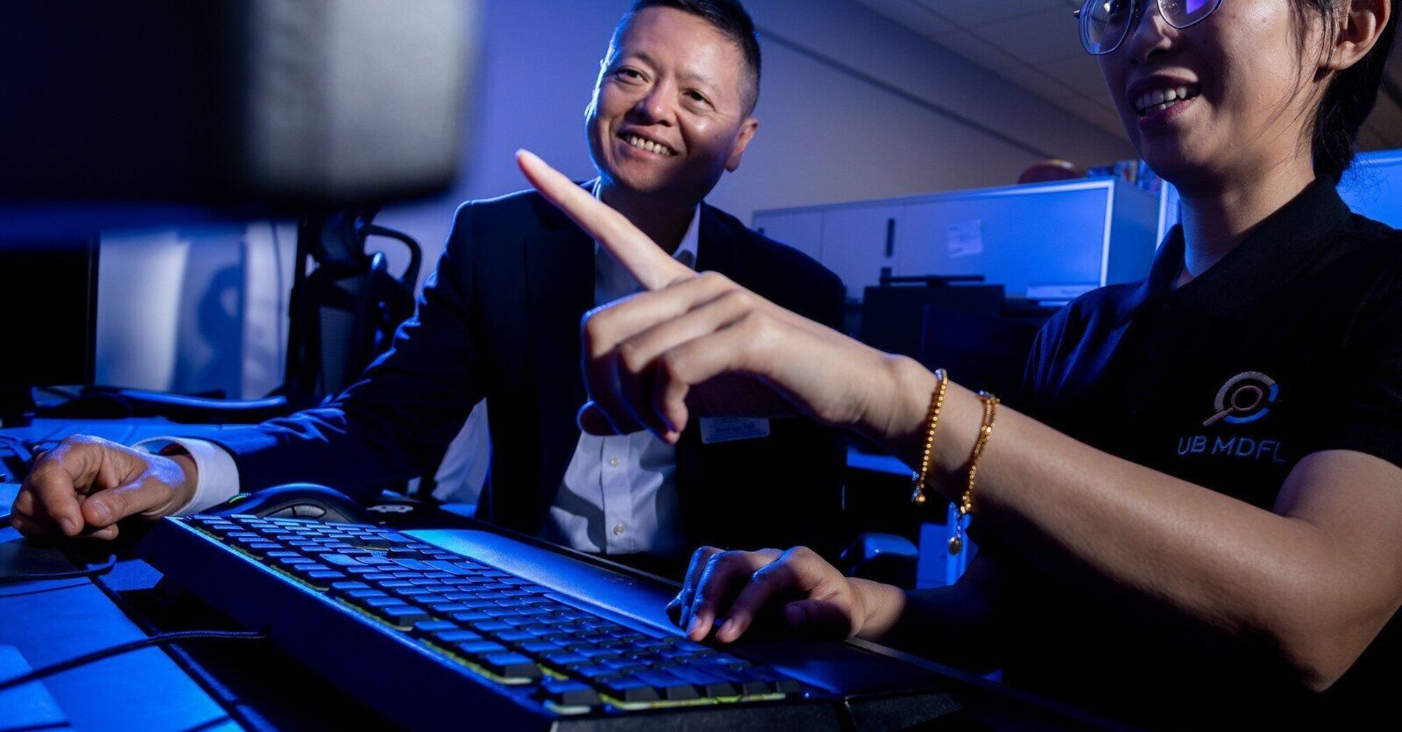 Lyu works with postdoctoral researcher Shan Jai in the UB Media Forensics Lab.