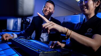 Lyu works with postdoctoral researcher Shan Jai in the UB Media Forensics Lab.