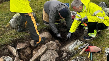 Archaeologists examine remains of Viking shelter