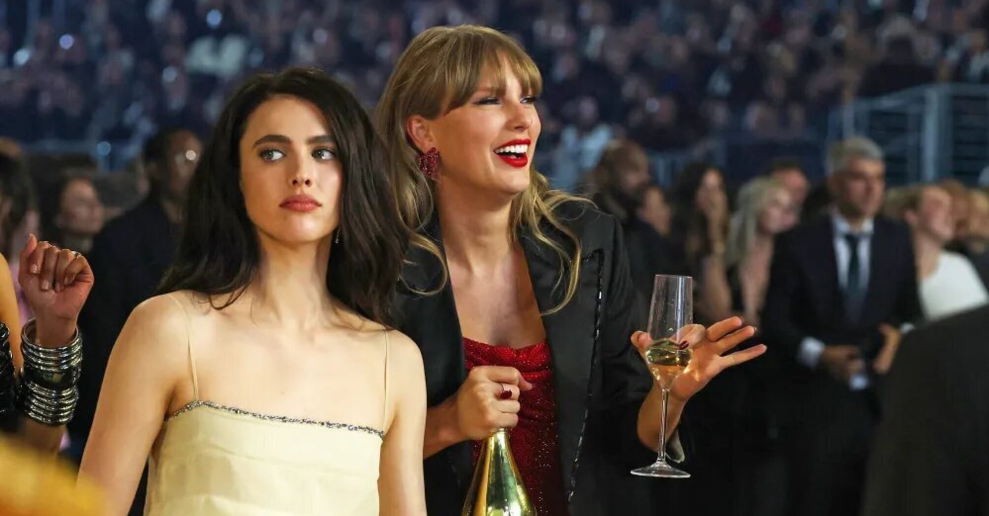 Taylor Swift Celebrates with Champagne While Dancing to Charli XCX at 2025 Grammy Awards