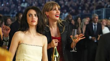 Taylor Swift Celebrates with Champagne While Dancing to Charli XCX at 2025 Grammy Awards