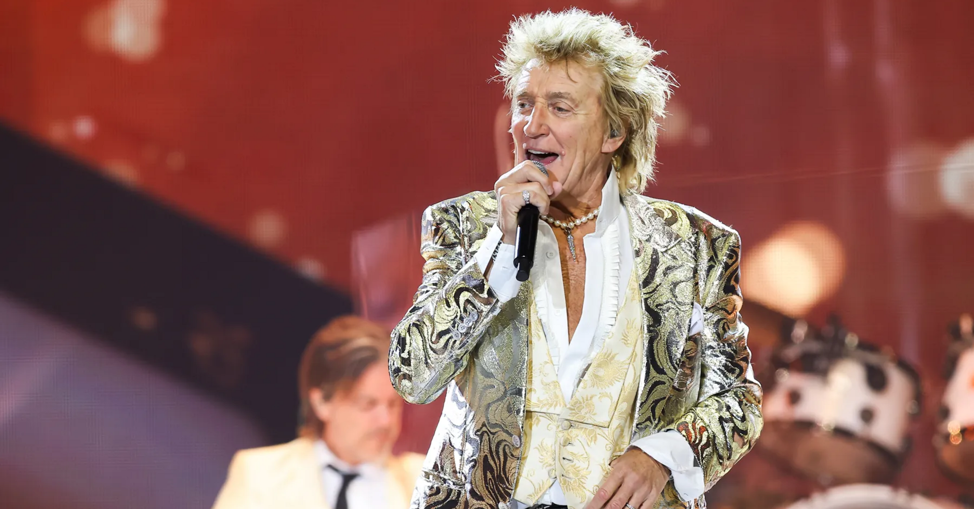 Rod Stewart, 80, Enjoys Whisky and Jokes About Growing Up at 200th Vegas Show