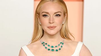 Lindsay Lohan Showcases Bridal Elegance in a Stunning Gown at the 2025 Vanity Fair Oscar Party