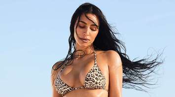 Kim Kardashian Stuns in New Hot Photo Shoot for SKIMS Swimwear